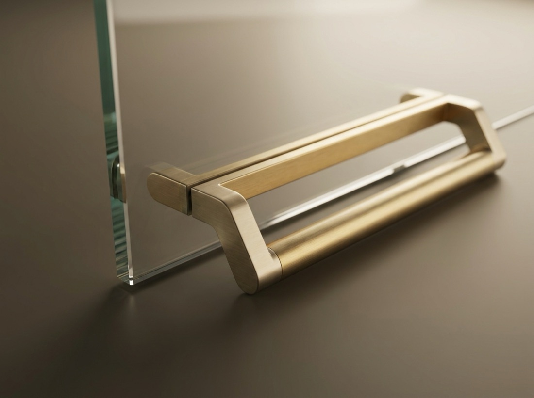 Cabinet pulls displayed on the showroom wall